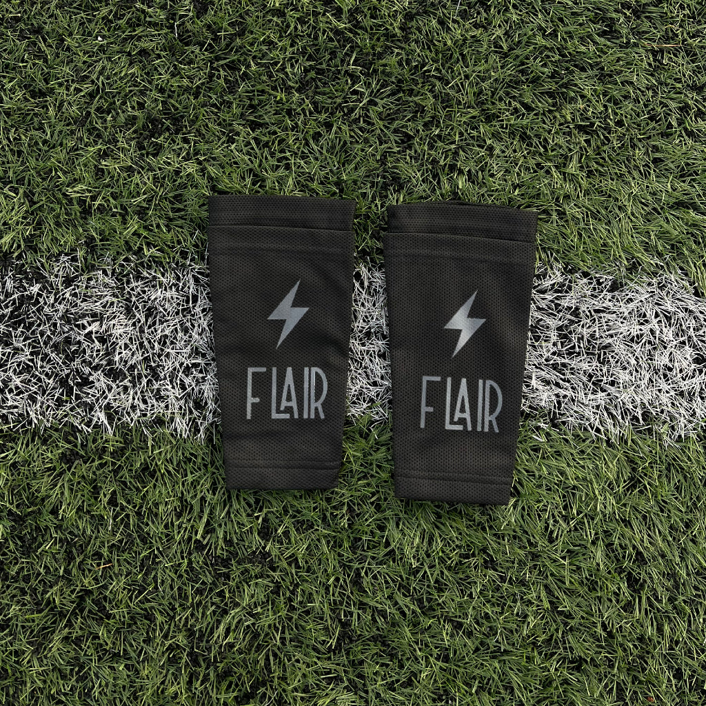 Flair - benskinneholder sort